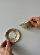 Vintage-Set aus goldener Espressotasse und Untertasse – zwei Sammlerstücke